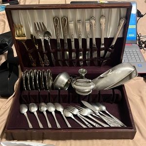 Whole set of silver utensils and silver plate